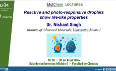 Reactive and photo-responsive droplets show life-like properties